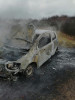 O mașină a ars, în apropierea unei mănăstiri din județul Alba