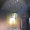 Bucătărie distrusă de un incendiu. O femeie a fost transportată la spital