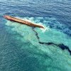 O deversare uriașă de petrol a inundat plajele din Trinidad-Tobago după ce un vas misterios s-a răsturnat în apropiere de țărm