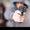 Buzoian amenințat cu pistolul în trafic