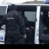 Percheziții în București și în alte două județe, la un grup infracțional specializat în camătă și șantaj