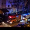 Incendiu într-un bloc din Târgu Jiu. O persoană a fost găsită în stare de inconștiență în apartament și resuscitată la fața locului