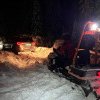 Un copil de 5 luni și doi adulți, ajutați de salvamontiștii din Alba. Au rămas blocați cu autoturismul în zăpadă
