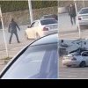 VIDEO: Cascadorii filmate în parcarea Auchan Bacău. Un șofer a făcut drifturi cu un BMW, iar un bărbat s-a urcat pe cupola bolidului