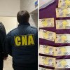 Ofițerii CNA au descins cu percheziții în capitală: Un suspect, care „vindea” permise cu 1500 de euro bucata, reținut