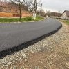 Continuă lucrările de asfaltare în Biled/FOTO