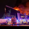 Doliu naţional în Rusia după atacul sângeros de la Crocus City Hall: Mesaj pe un panou al sălii de concerte / Foto