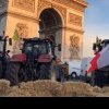 VIDEO. Bulevardul Champs-Élysées din Paris, blocat cu tractoare de fermieri. Peste 60 de persoane, arestate