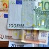 Euro rămâne la trei bani depărtare de 5 lei
