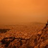 Imagini apocaliptice din Grecia. Cerul a devenit portocaliu și Atena abia se mai vede din cauza valului de praf saharian