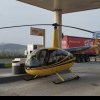 FOTO: Un mini elicopter a aterizat la Vințu de Jos și a alimentat la o benzinărie din zonă. Pilotul, un bărbat din Germania