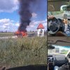 UPDATE. Mașină cuprinsă de flăcări, în urma unui accident produs după podul de la Albina