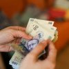 Salariul minim va creşte la 3.700 de lei brut, de la 1 iulie, anunță premierul Ciolacu
