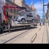Şofer amendat şi cu maşina „ridicată”, după ce a parcat prea aproape de liniile de tramvai