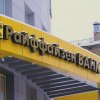 Raiffeisen Bank oprește plățile în dolari pentru clienții săi din Rusia