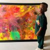 Un copil în vârstă de un an din Africa a fost numit cel mai tânăr pictor din lume
