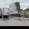 Peste 100 de cauciucuri au ars într-o parcare plină cu TIR-uri