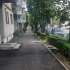 ADP Piteşti continuă reparaţiile în cartiere: cartier Prundu, trotuare şi alei de acces, bloc B1
