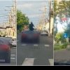 VIDEO Scene ca-n Vestul Sălbatic la Turnu Măgurele: Bărbat urcat pe plafonul unei mașini în mers îndreaptă o armă spre trecători și alți șoferi