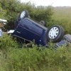 ACCIDENT rutier pe DJ 704 K: Un șofer a pierdut controlul asupra mașinii și s-a răsturnat într-un canal de colectare a apei pluviale