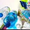 PROTEJAREA MEDIULUI ÎNCONJURĂTOR Supermarketul Auchan din România mărește bonusul pentru sticlele reciclate